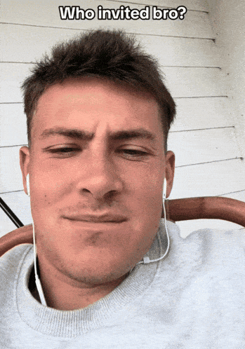 a man wearing ear buds is making a funny face with the caption " who invited bro "