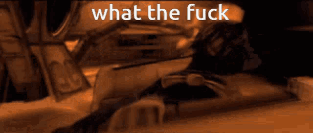 a blurred image of a person with the words what the fuck above them