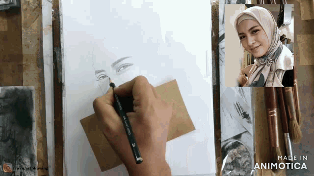 a drawing of a woman 's face is being made in animatica