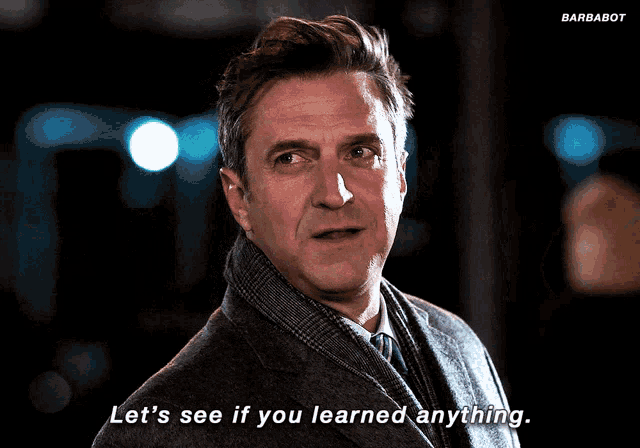 a man in a suit and tie is saying let 's see if you learned anything