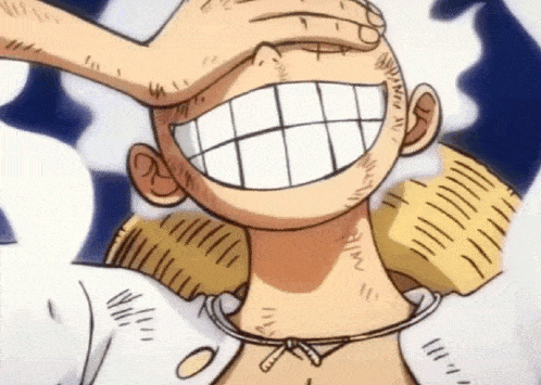 a close up of a cartoon character covering his face with his hand and smiling .