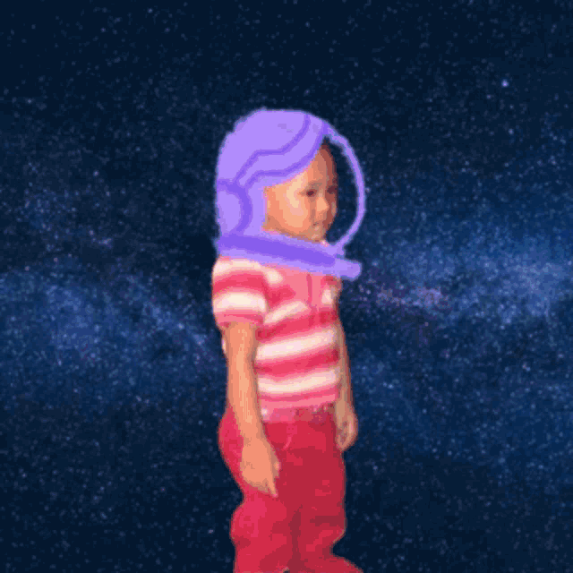 a child wearing a space helmet is standing in front of a starry sky