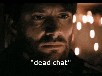 a man with a beard says " dead chat "