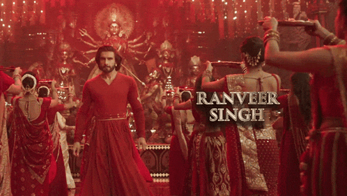 a movie poster for ranveer singh with a man in a red shirt