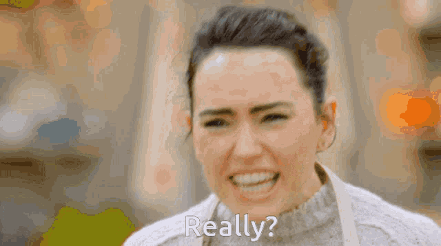 a woman making a funny face with the words really on her face