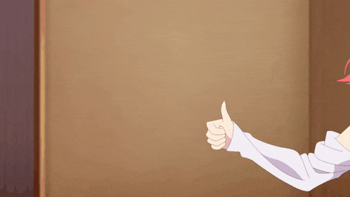 a girl with red hair is giving a thumbs up sign