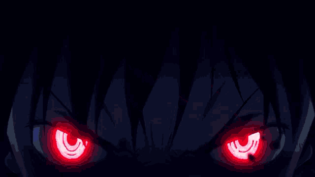 a close up of a red light on a blue background