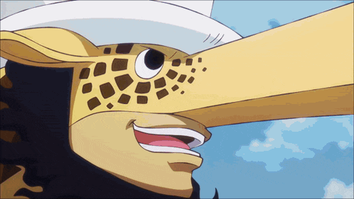 a close up of a giraffe 's face with a long nose