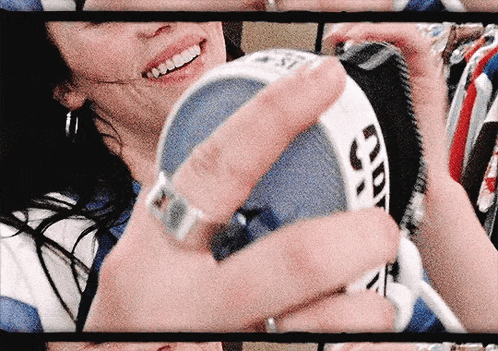a close up of a person holding a can that says cd