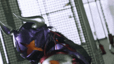 a purple monster with horns is standing in front of a window