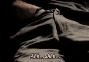 a man sitting in a car with his mouth open and the words ahh uhhh written below him