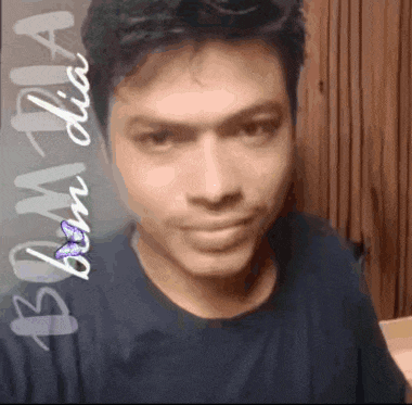 a man in a black shirt with the words bom dia on the bottom right