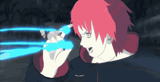 a cartoon character with red hair is holding a blue object and says huy ahhh