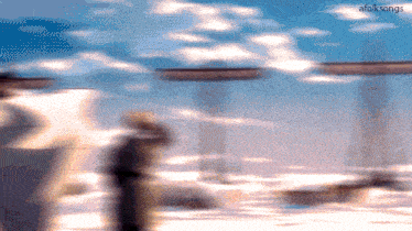 a blurred image of a cloudy sky with the words afolksongs at the top