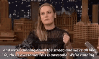 a woman says " and we 're running down the street and we 're all like ya "
