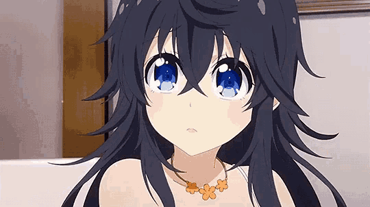a girl with long black hair and blue eyes is wearing a necklace with flowers on it
