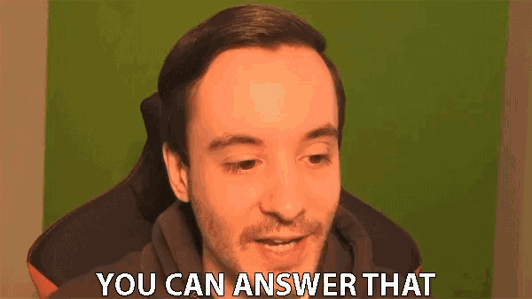 a man in a gaming chair says " you can answer that " in front of a green background