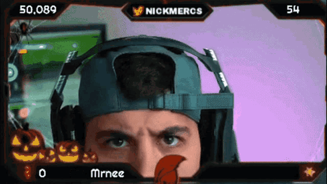 a man wearing headphones with the name nickmercs on top