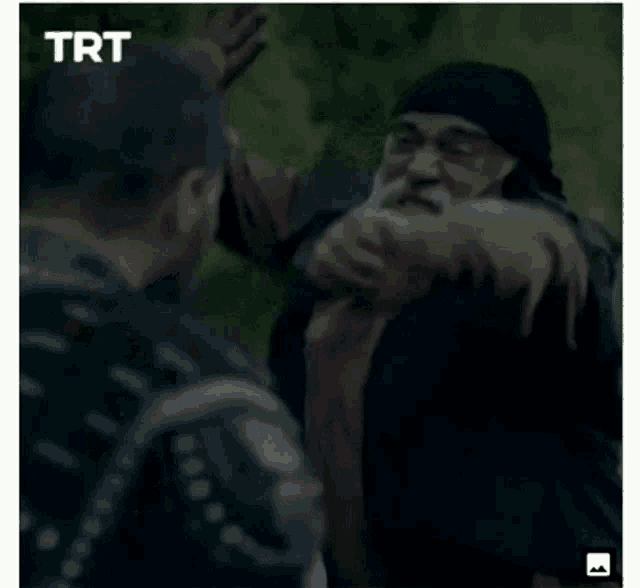 a trt logo can be seen in the corner of the screen