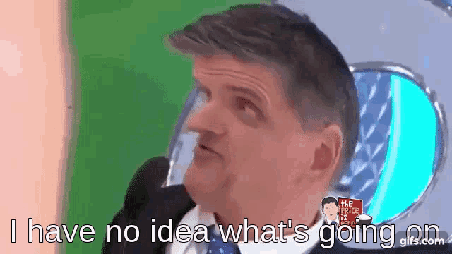 a man in a suit and tie is saying i have no idea what 's going on .