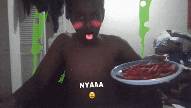 a shirtless boy is holding a plate of red peppers and says nyaaa on the bottom right