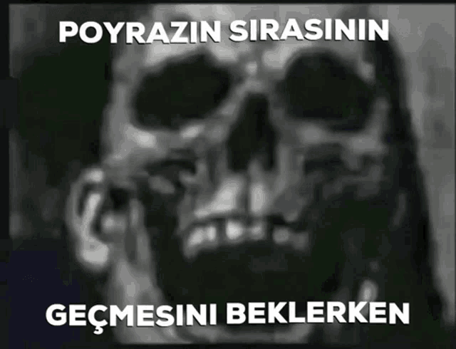 a black and white image of a skull with the words " pourazin sirasinin " written above it