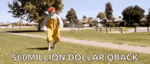 a man in a mcdonald 's costume is running in a park with the words $ 60 million dollar qback below him