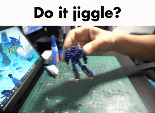 a picture of a person holding a toy with the words " do it jiggle " above it