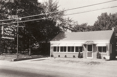 a black and white photo of a restaurant named the dwarf grill