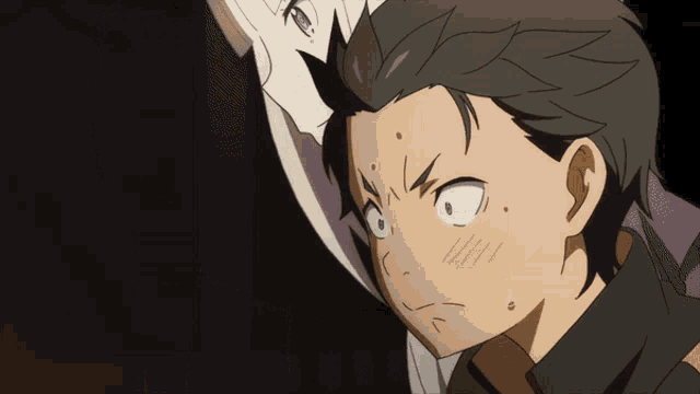 a man and a woman are looking at each other with their eyes closed