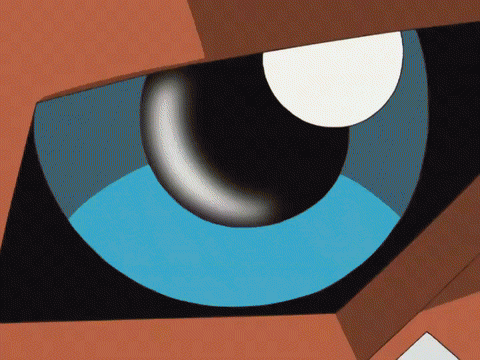 a close up of a blue eye with a white circle