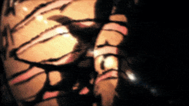 a close up of a drawing of a person 's face with a blurred background
