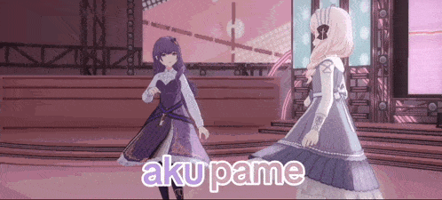 two anime girls are dancing on a stage and the words aku pame are visible