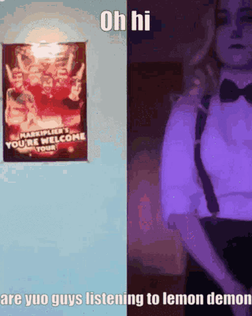 a woman in a tuxedo is standing next to a poster that says oh hi are yuo guys listening to lemon demon .