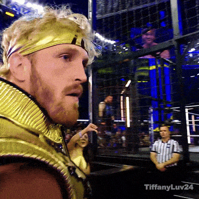 a man wearing a gold headband stands in a ring with tiffanyluv24 written on the bottom right
