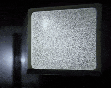 a television with a lot of static on it 's screen