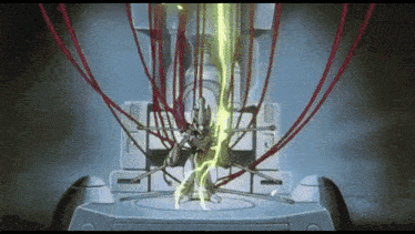 a machine with a lot of wires coming out of it and a light coming out of it