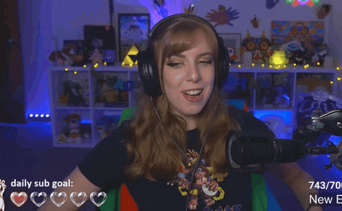 a woman wearing headphones and a shirt that says donkey kong