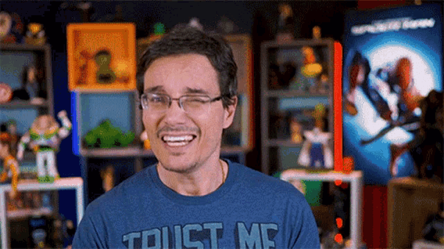 a man wearing a shirt that says trust me