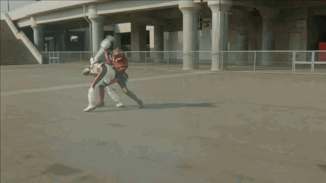 a man in a superhero costume is riding a white motorcycle