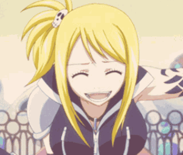 a girl with blonde hair and a ponytail is laughing with her eyes closed