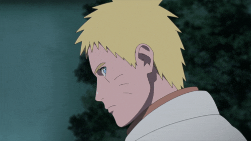 a close up of a person 's face with yellow hair and blue eyes