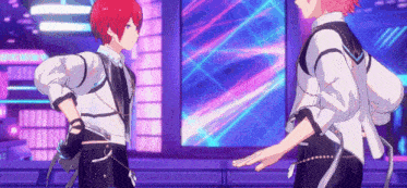 two anime characters are standing next to each other in front of a colorful background .