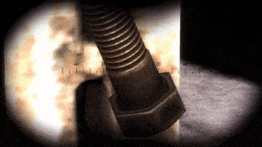 a close up of a nut and bolt with a ruler showing the numbers 40 and 20