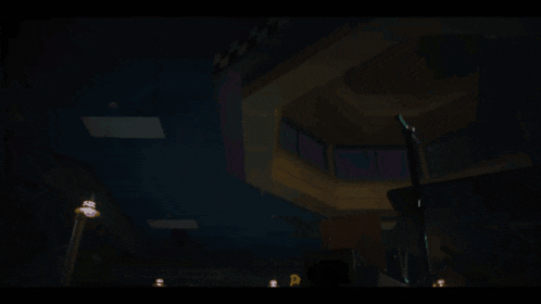 a dark room with a sign that says ' a & m ' on it