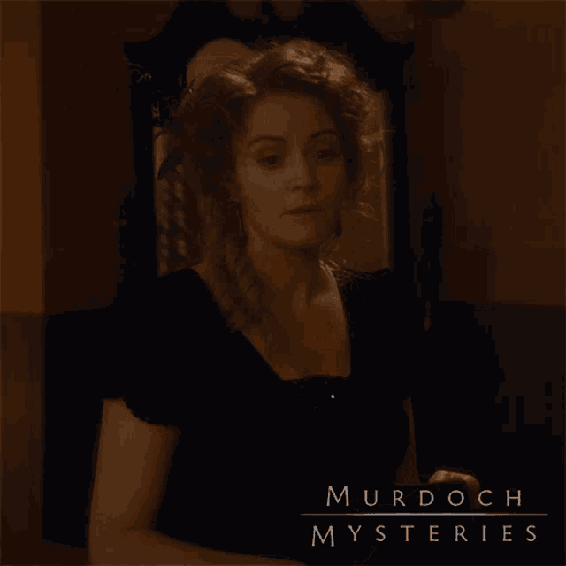 murdoch mysteries shows a woman looking in a mirror