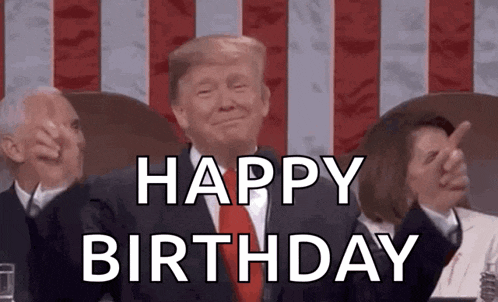 donald trump is giving a thumbs up while sitting in front of a flag and says happy birthday .