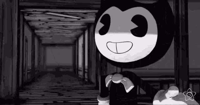 bendy the ink machine is standing in a hallway in a black and white photo .