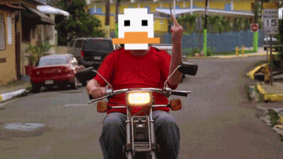 a man in a red shirt is riding a motorcycle with a pixelated duck face on his face