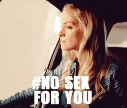 a woman is driving a car with the words #no sex for you